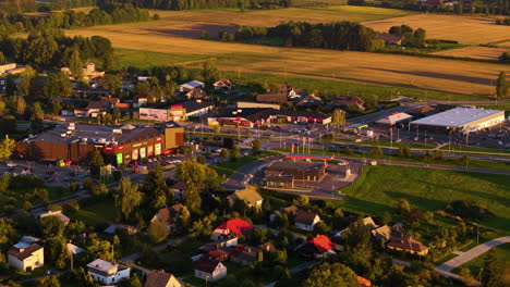 modern commercial buildings (retail shopping, gas station, and residential homes) in the suburbs of sigulda, latvia.