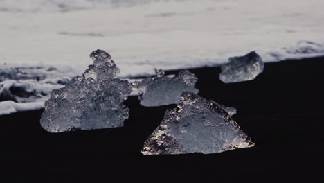 slow motion shots of blue icebergs on diamond beach in iceland