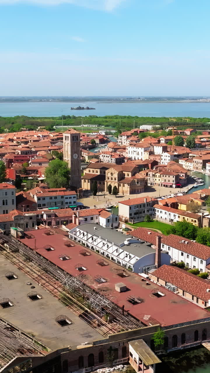 Aerial drone view of Venice City, Italy in daytime. Vertical