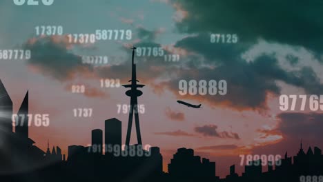 animation of numbers processing over airplane taking off and cityscape in background