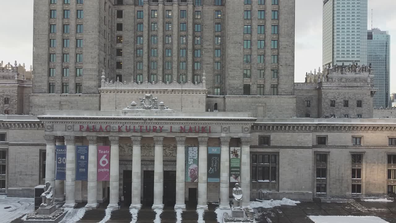 Drone footage of Palace of culture and science building with sun rays 2