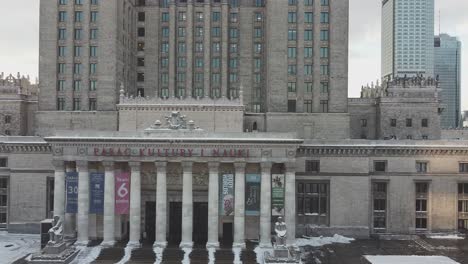 drone footage of palace of culture and science building with sun rays 2