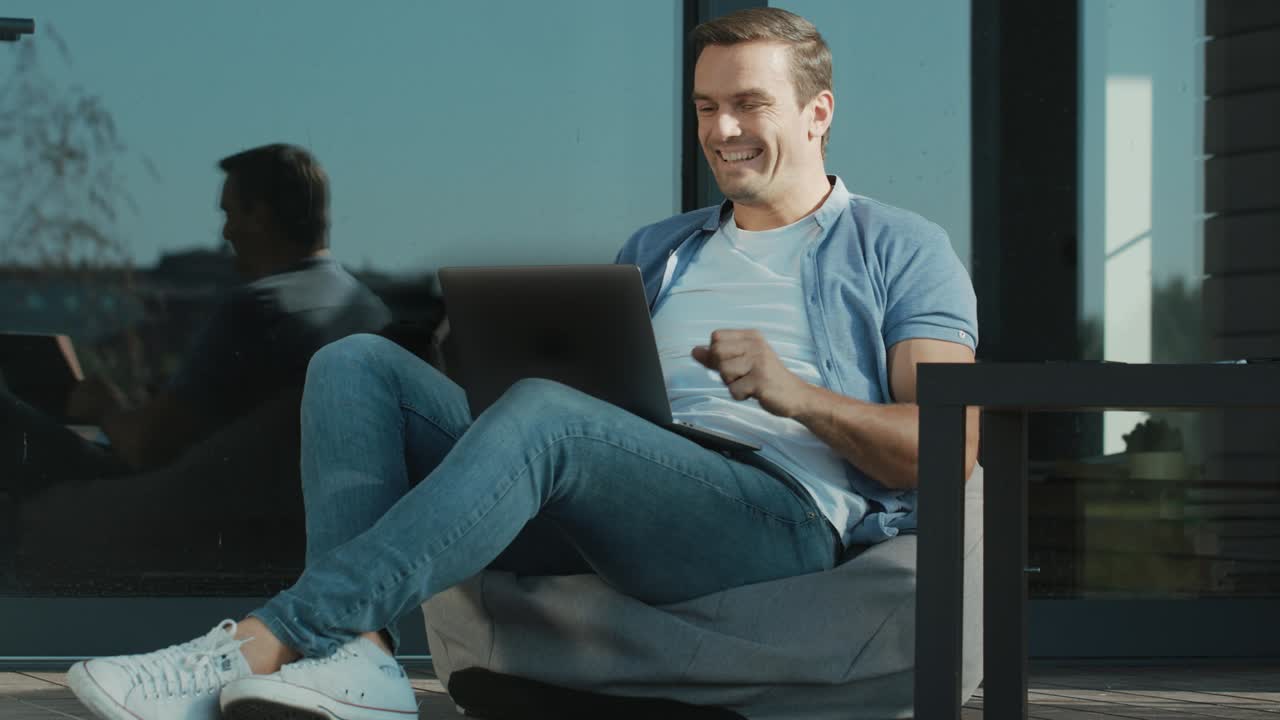 Business man achieving concept. Happy man waving hands yes