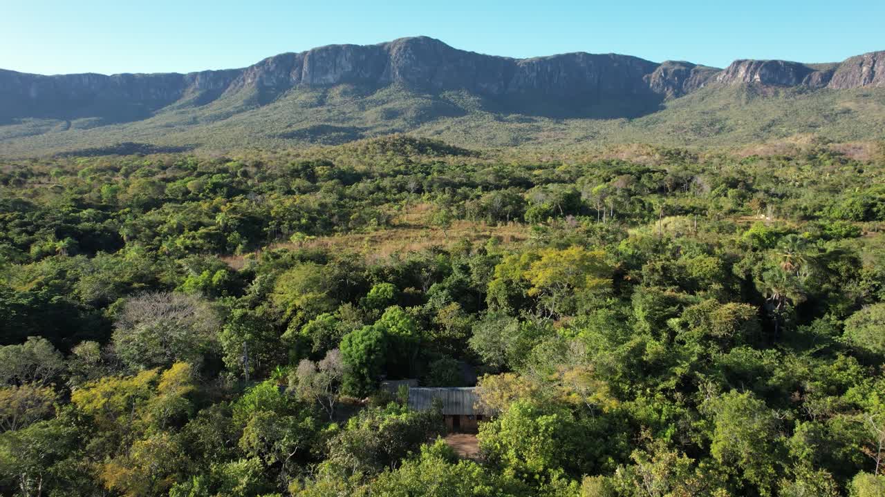drone Guardião waterfall, blue water, sunny day, incredible landscape, in the Vão do Moleque community in Chapada dos Veadeiros