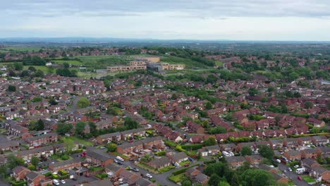 aerial footage over a housing estate in bolton, england