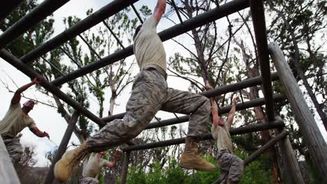 military soldiers climbing monkey bars 4k