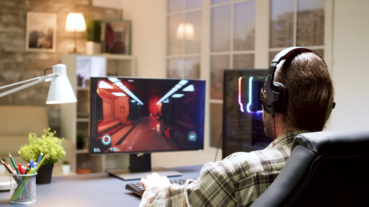 Man playing video game at desk