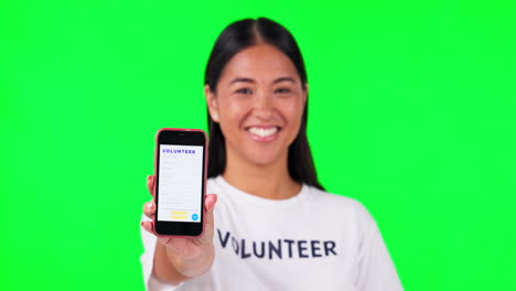 Phone,-volunteer-and-a-woman-on-a-green-screen