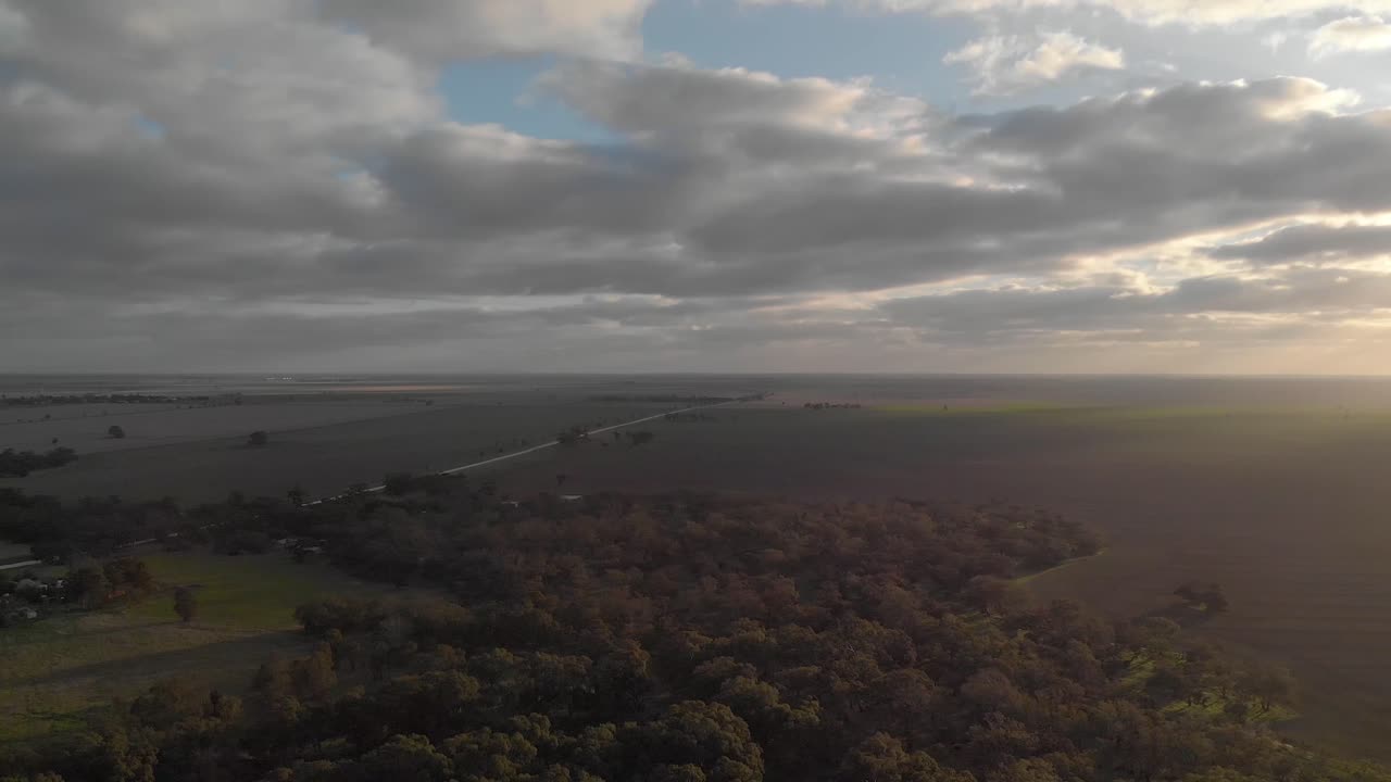 Aerial shot orbiting around an agricultural land in the wimmera in the outback.