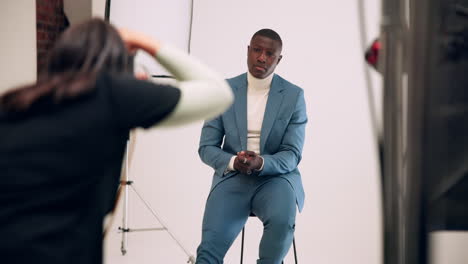 man in blue suit photoshoot
