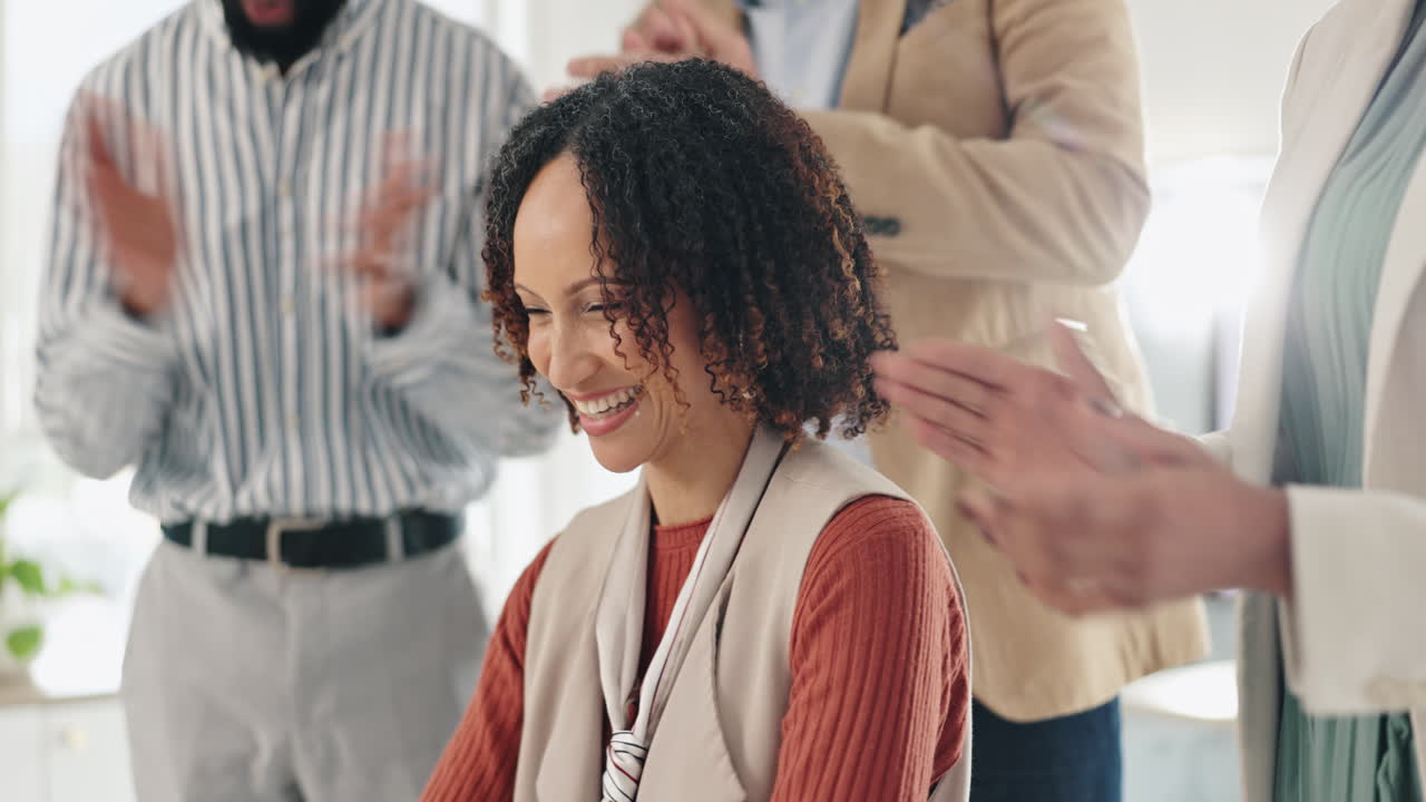 Business team celebrating success with applause