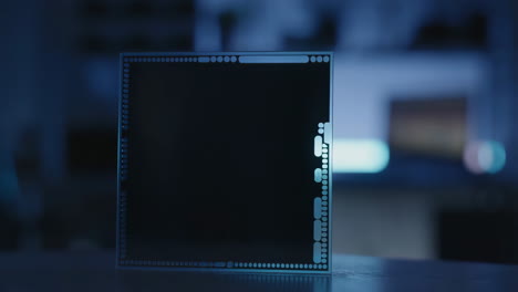 close-up of a modern computer chip with blue light reflections