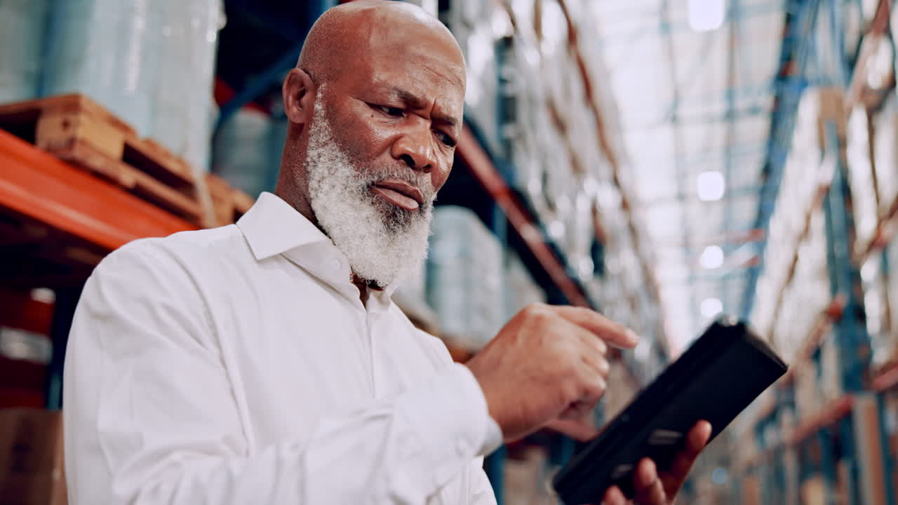 Warehouse Manager Inspecting Inventory
