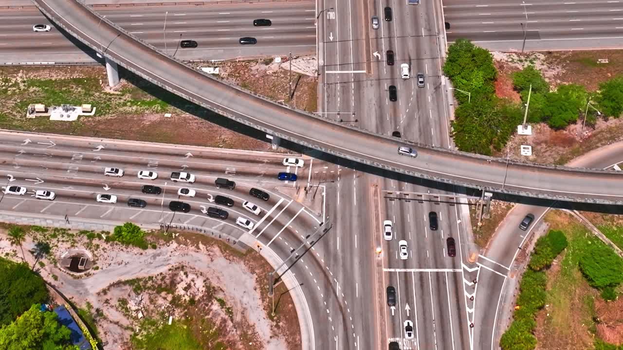 Traffic flows at major intersection in Miami, USA captured from above