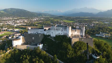 beautiful orbiting drone shot above salzburg castle