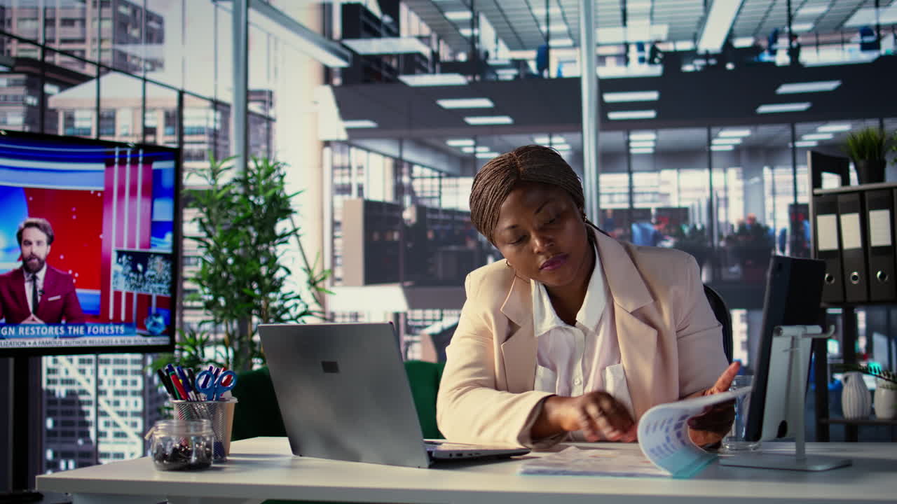 Businesswoman reviewing documents in a modern office