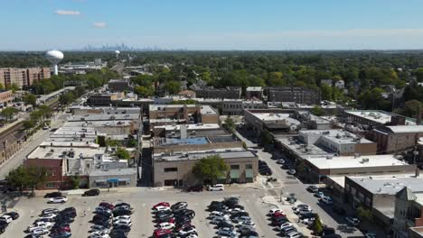 aerial view of suburban town with chicago skyline in the background
