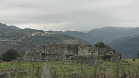 lindoso castle with verdant mountain backdrop, portugal