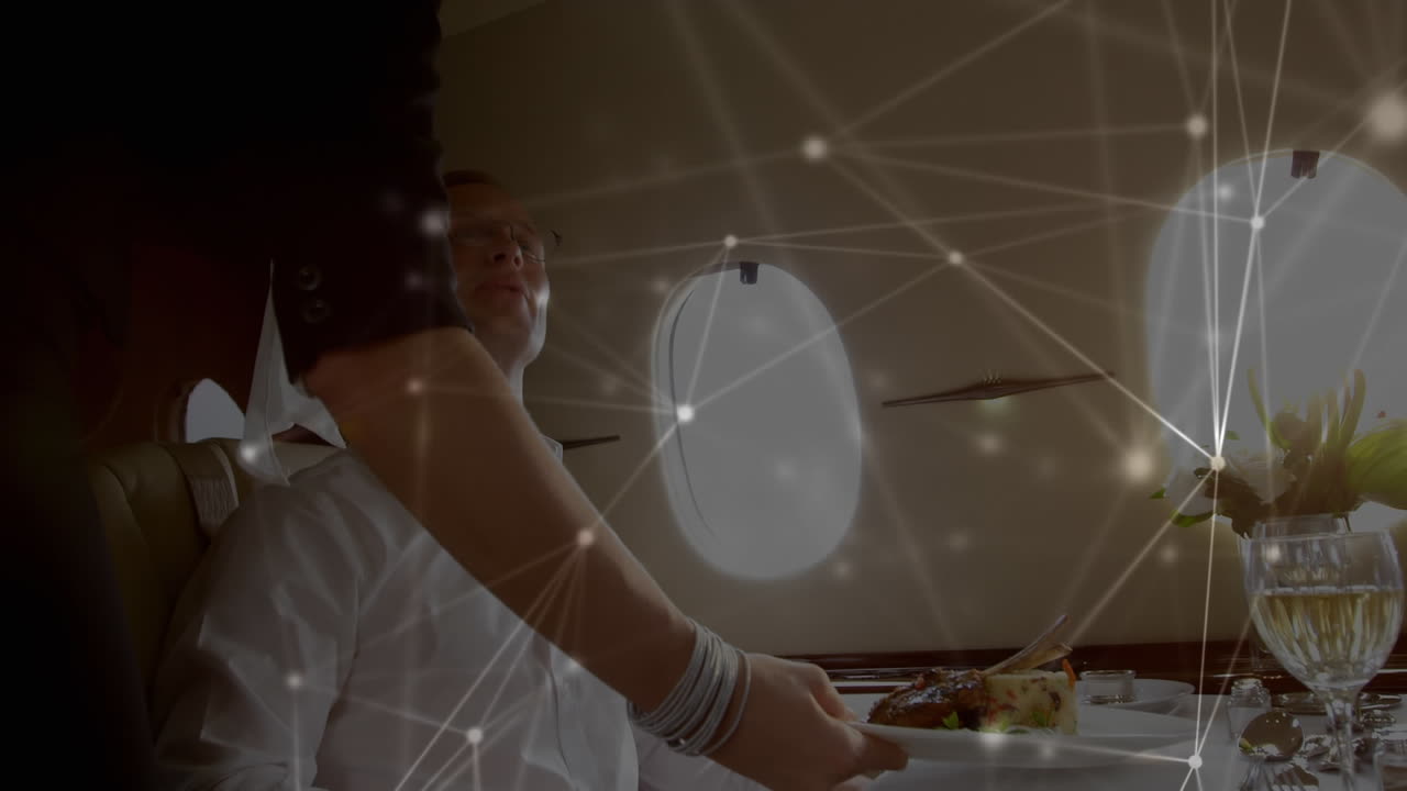 Animation of global network of connections with waiter serving a dish in the airplane