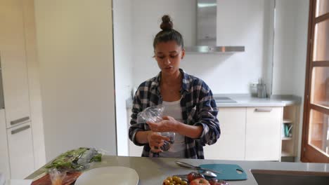 woman preparing a healthy meal in a kitchen