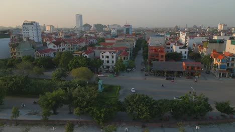 AERIAL-VIEW-IN-NINH-BINH-CITY,-VIETNAM,---SOUTHEAST-ASIA