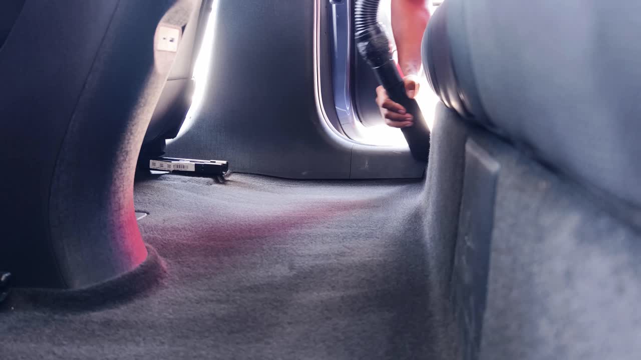 Vacuuming a Car Interior