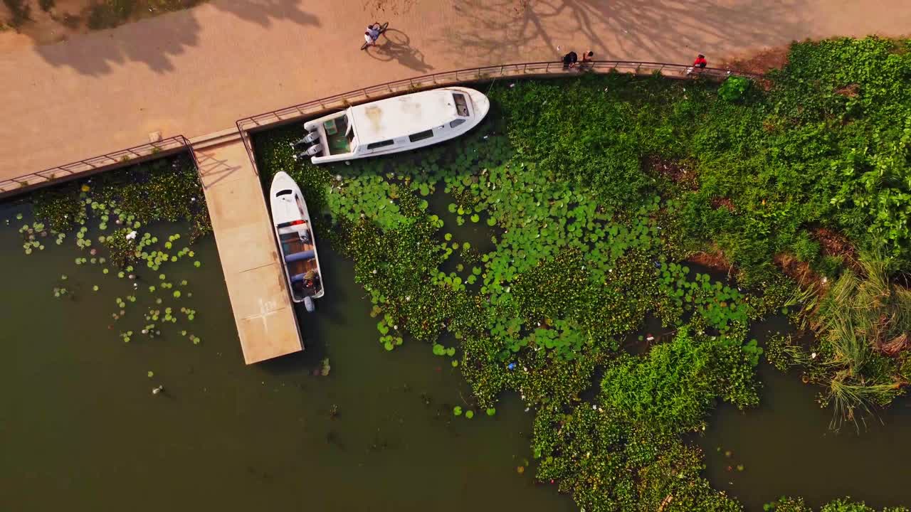 Beautiful jib up of two docked boats in Jabi lake in Abuja, Nigeria