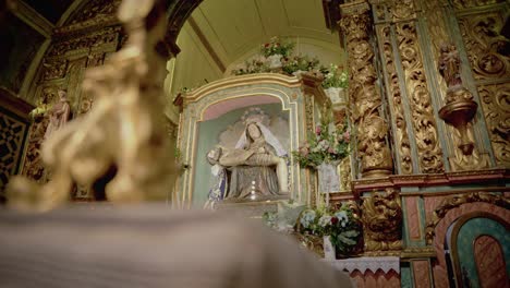 Beautiful-wide-image-statue-of-our-lady-of-sorrow-holding-jesus-christ-from-a-15th-sanctuary