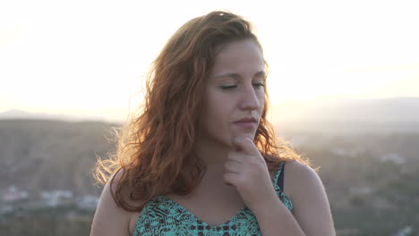 portraits of a woman with red hair