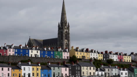 colorful houses and historic church in a european town