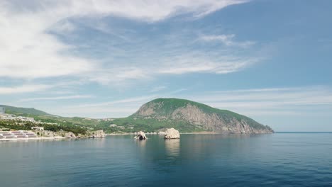 gurzuf, crimea - aerial panoramic view on gurzuf bay with bear mountain ayu-dag and rocks adalary, artek - oldest children vacation camp. yalta region, the south coast of crimea peninsula