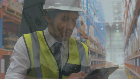 animation of data processing over caucasian man with tablet working in warehouse