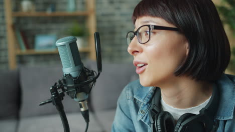 woman podcaster recording
