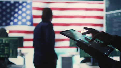 cybersecurity expert in a governmental it environment with the american flag