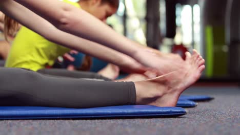 Women-exercising-in-fitness-class