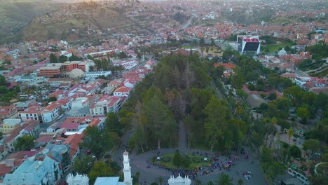 aerial drone view flying over the city of sucre, in the andes mountains of bolivia