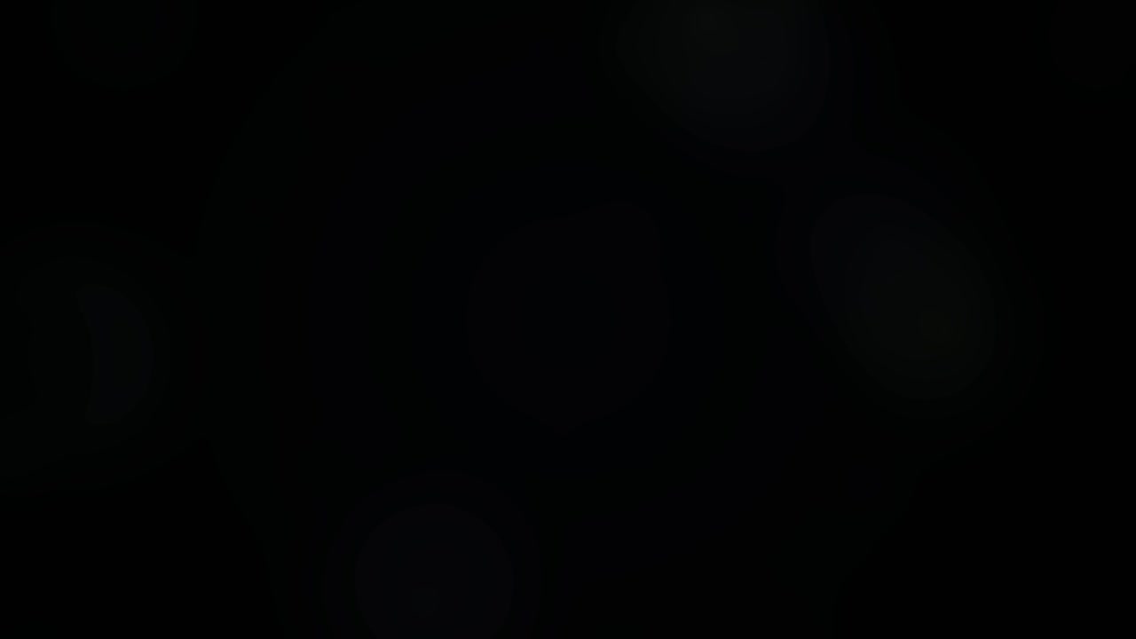 Subtle Lens Flares and Bokeh Light Effects on Black Background