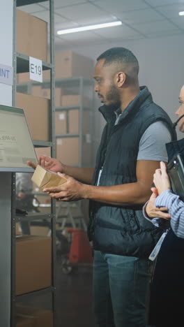 warehouse workers inspecting packages