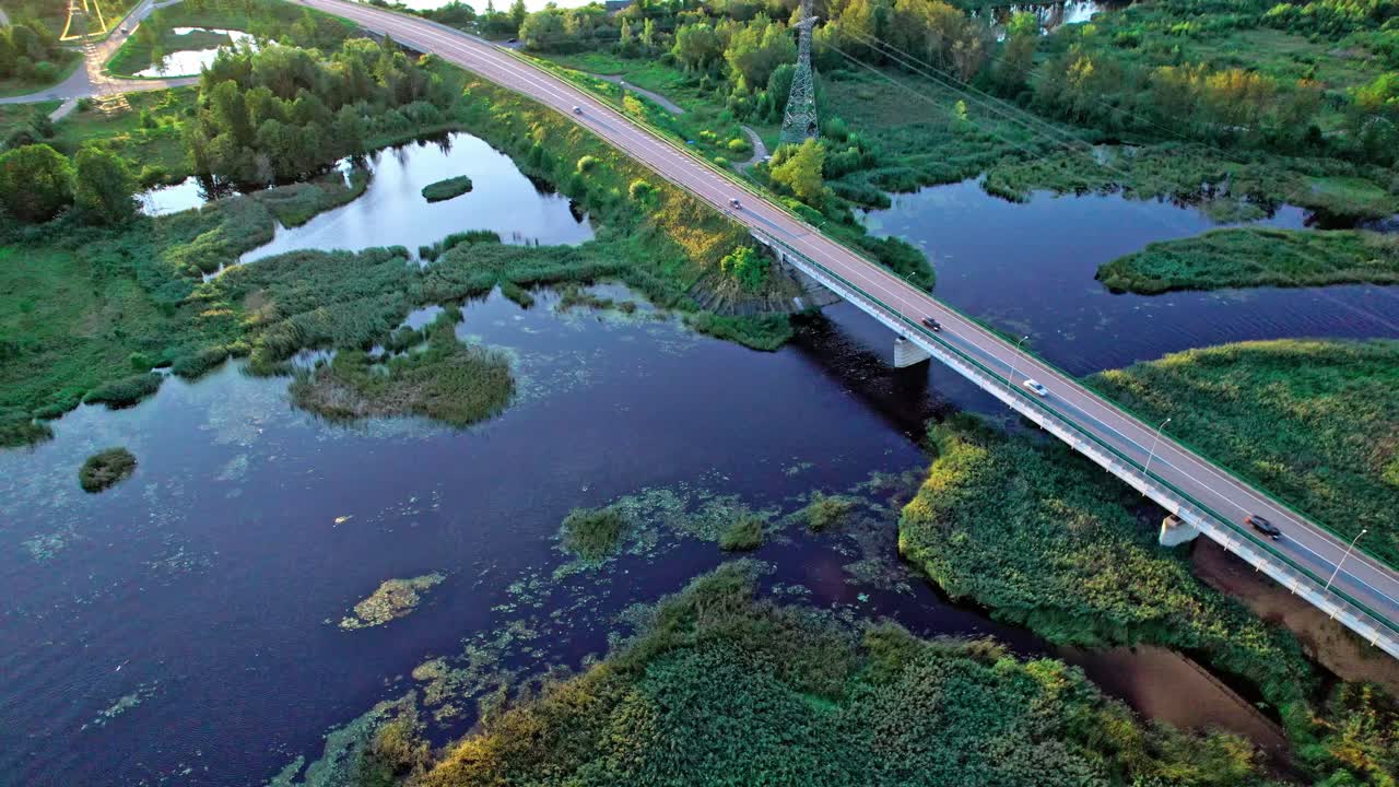 Beautiful aerial view of a bridge over wetlands in Latvia