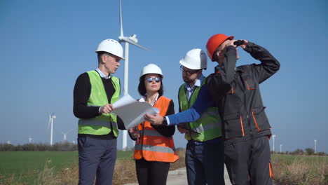 wind farm engineers reviewing plans
