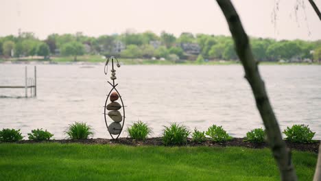 Rock-art-sculpture-by-lake-shore