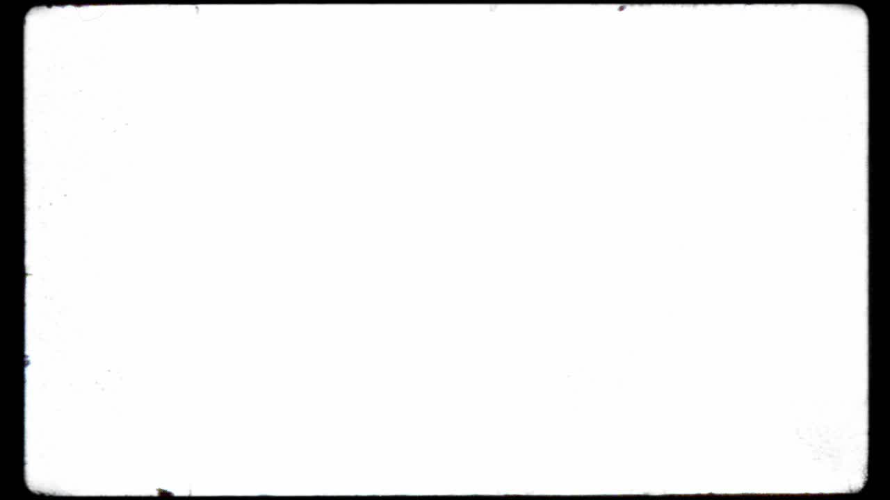 Vintage 8mm or 16mm film frame border with rounded corners, dust, and scratches. Seamless loop on a white background for use as a luma matte or overlay to create a retro cinematic look