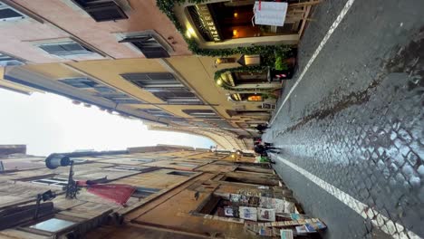 walking through narrow streets surrounded by tall buildings