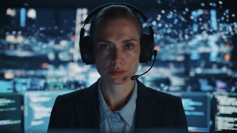 focused woman working in a high-tech office