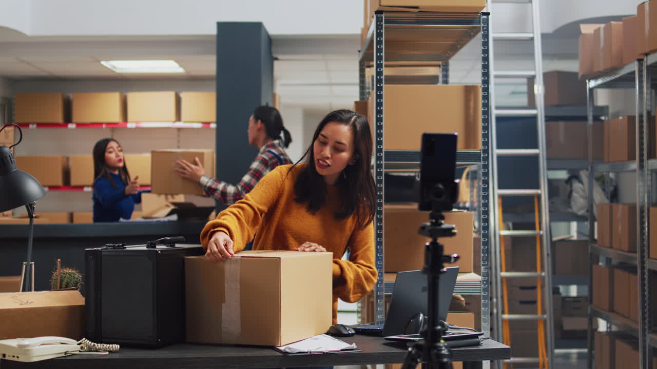 Warehouse filming with people and boxes