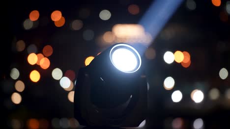 Vibrant-Laser-Light-Projector-with-Multi-Colored-Bokeh-Background-for-Concerts-and-Shows,-Closeup