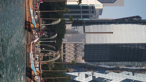 traditional dhow boats and modern skyscrapers on the doha waterfront