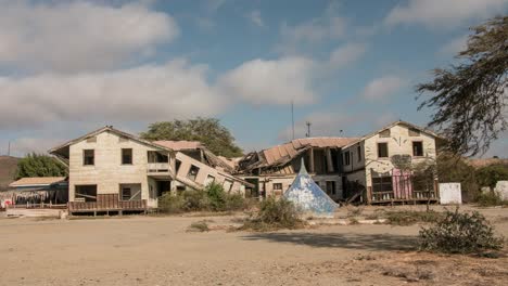 timelapse shot of an abandoned scary stroyed house in 4k, shot near the beautiful beach of lobitos, peru desert