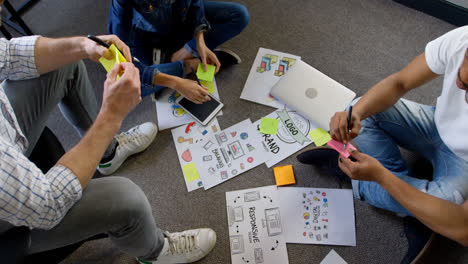 business people discussing over documents in office 4k