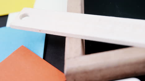 molecular structures against close up of school equipment on a table